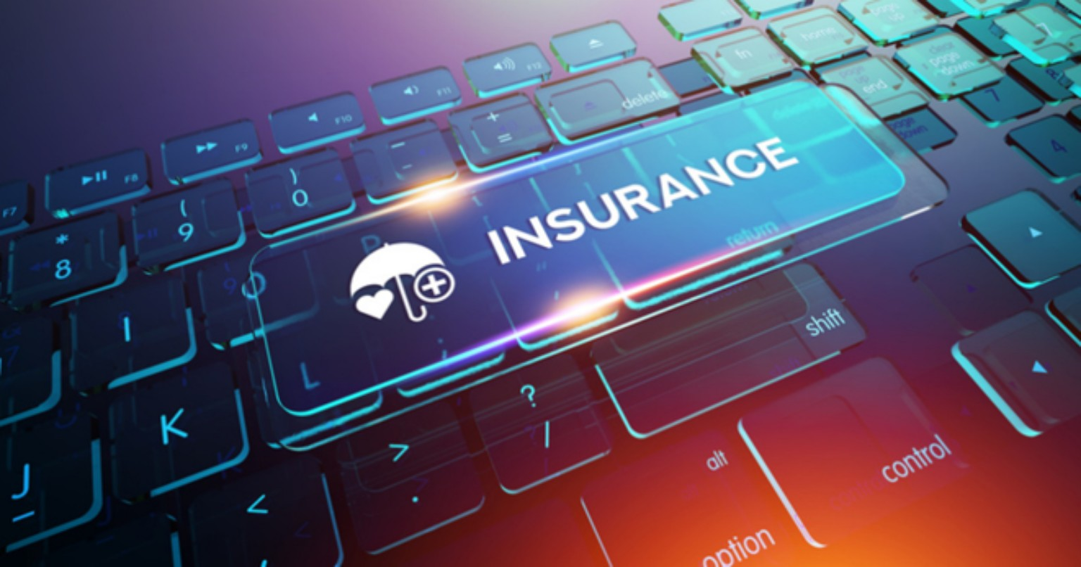 Life insurance umbrella displayed over a keyboard